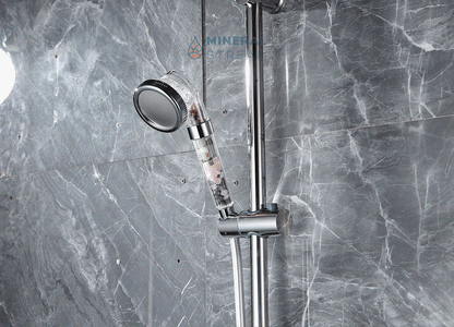 MineralStream Chakra shower head spraying water in high-pressure mode