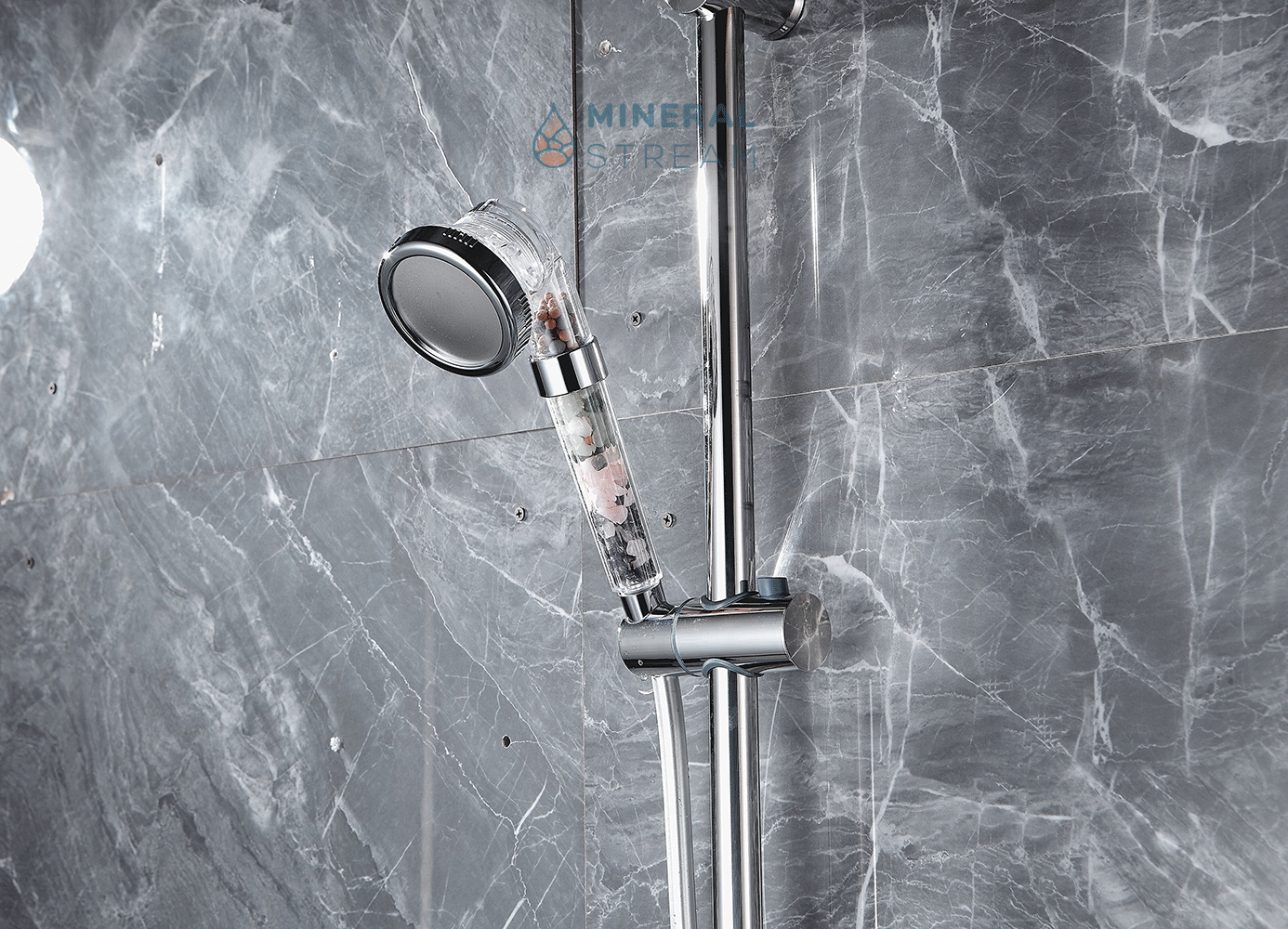 MineralStream Chakra shower head spraying water in high-pressure mode