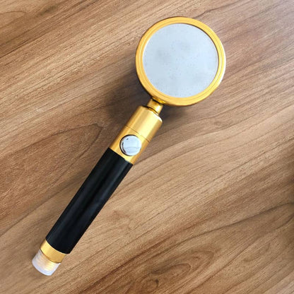 MineralStream Duo Shower Head held in hand showing the handheld design