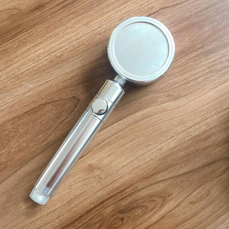 MineralStream Duo Shower Head spraying water in a shower